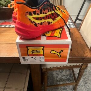 Puma Vibrant Orange and Red Sneakers